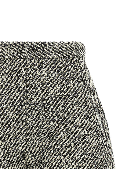Bermuda Shorts by Versace for women in virgin wool & nylon bicolour, black, gold, white, patterned & signature features a eye catching and short with a eye catching high rise.