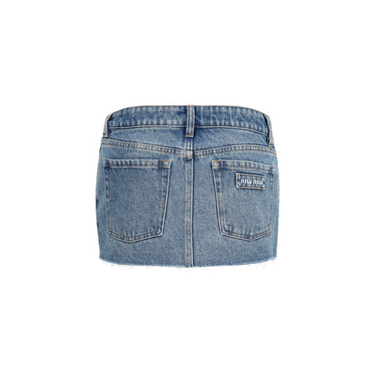 Skirt by Miu Miu for women in denim cotton blue features a contoured silhouette from the Women's Denim Straight Cotton Mini Skirt collection, characterized by its contoured mini for a contoured finish.