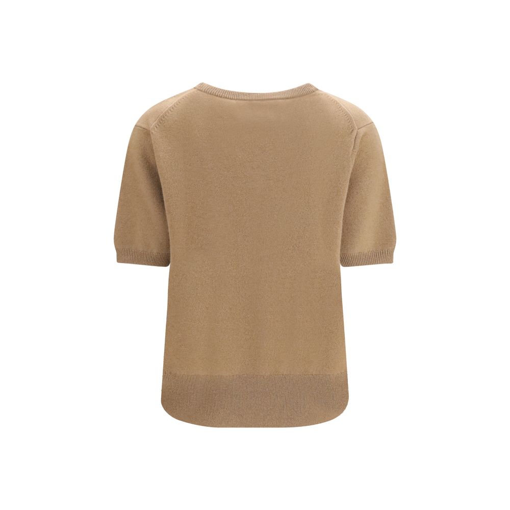 Sweater by Extreme Cashmere for women in nylon cashmere & capra leather beige showcases a downtown chic silhouette, artfully finished with a downtown chic v-neck neckline and for a sophisticated, high-end look.