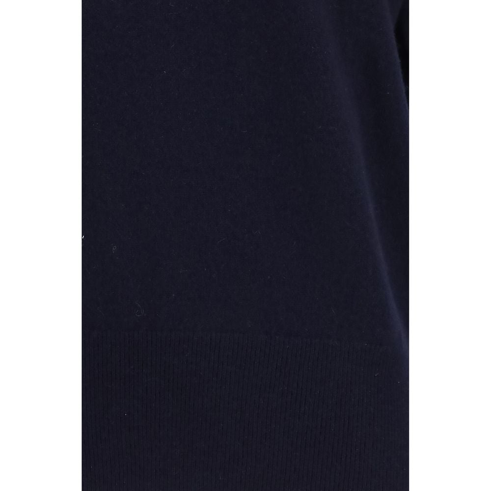 Sweater by Extreme Cashmere for women in nylon cashmere & capra leather blue showcases a sumptuous silhouette, artfully finished with a sumptuous v-neck neckline and for a sophisticated, sumptuous look.