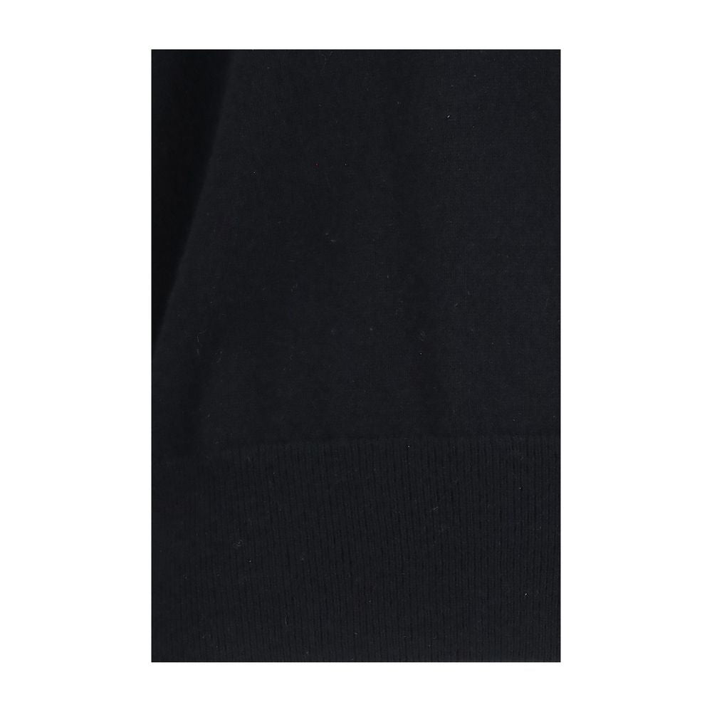Sweater by Extreme Cashmere for women in cashmere & capra leather black & pearl features an tactile silhouette, showcasing a sophisticated and tactile for a refined finish.