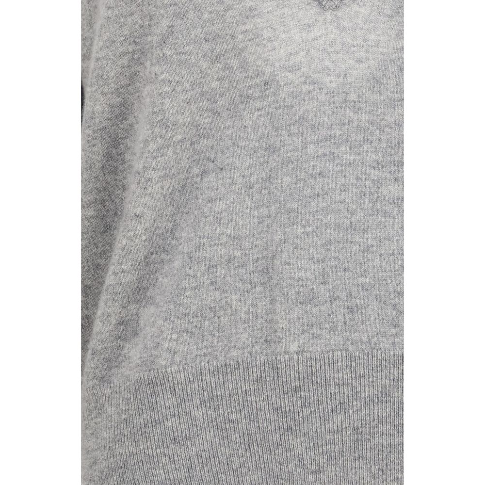Sweater by Extreme Cashmere for women in cashmere & capra leather gray showcases a downtown chic silhouette, artfully finished with a downtown chic and for a sophisticated, high-end look.
