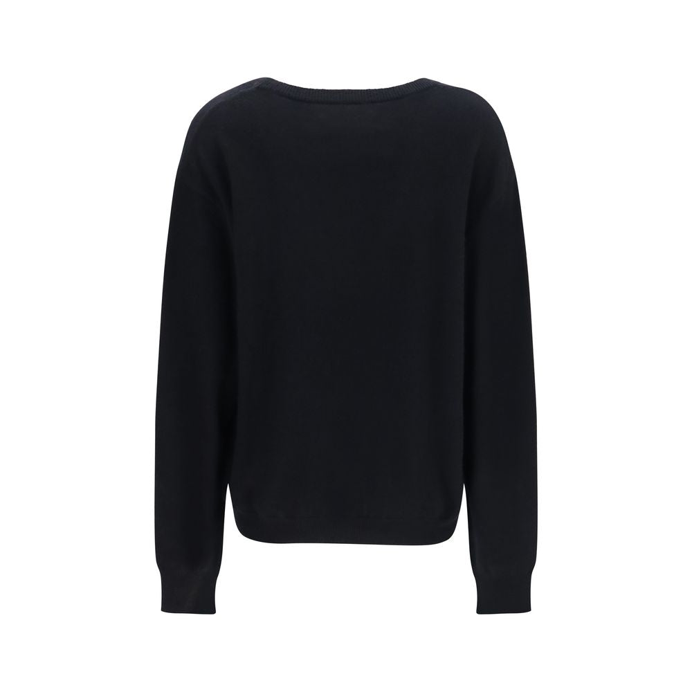 This Sweater by Extreme Cashmere for women in cashmere & capra leather black presents a understated silhouette, featuring a sophisticated v-neck neckline and for a understated finish.