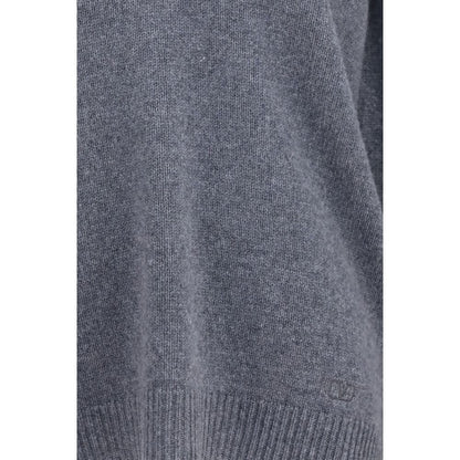 Sweater by Valentino Garavani for women in cashmere & capra leather gray showcases an masterful silhouette, artfully detailed with a masterful and for a sophisticated, premium finish.