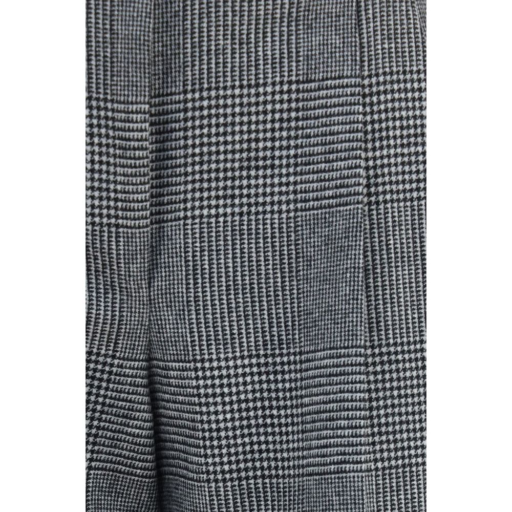 Trousers by Dolce & Gabbana for women in wool & capra leather gray presents a perennial silhouette, meticulously tailored with a regular-fit cut, long finish, and an elegant .