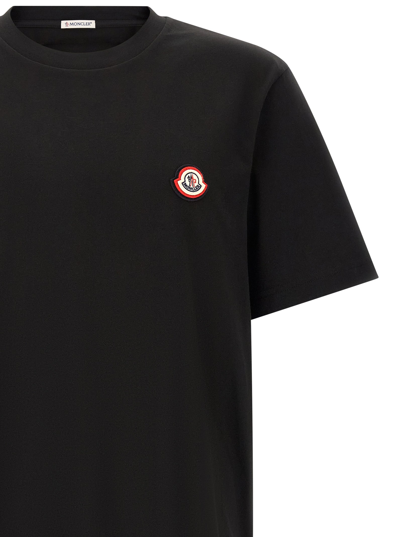T-Shirt by Moncler for men in cotton black features a plush silhouette, showcasing a sophisticated crew neckline and for a truly plush finish.