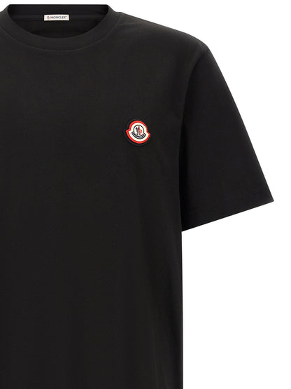 T-Shirt by Moncler for men in cotton black features a plush silhouette, showcasing a sophisticated crew neckline and for a truly plush finish.