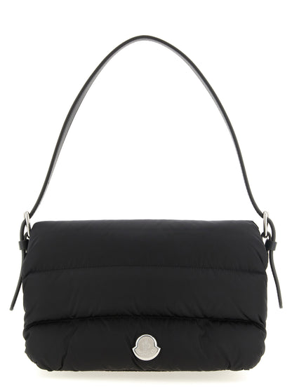 Mini Shoulder Flap Bag by Moncler for women in polyamide leather black, silver & signature features an effortlessly chic silhouette with a secure flap, magnetic & buckle, ample , and versatile shoulder-strap, adjustable-strap & handle for effortlessly chic everyday luxury.