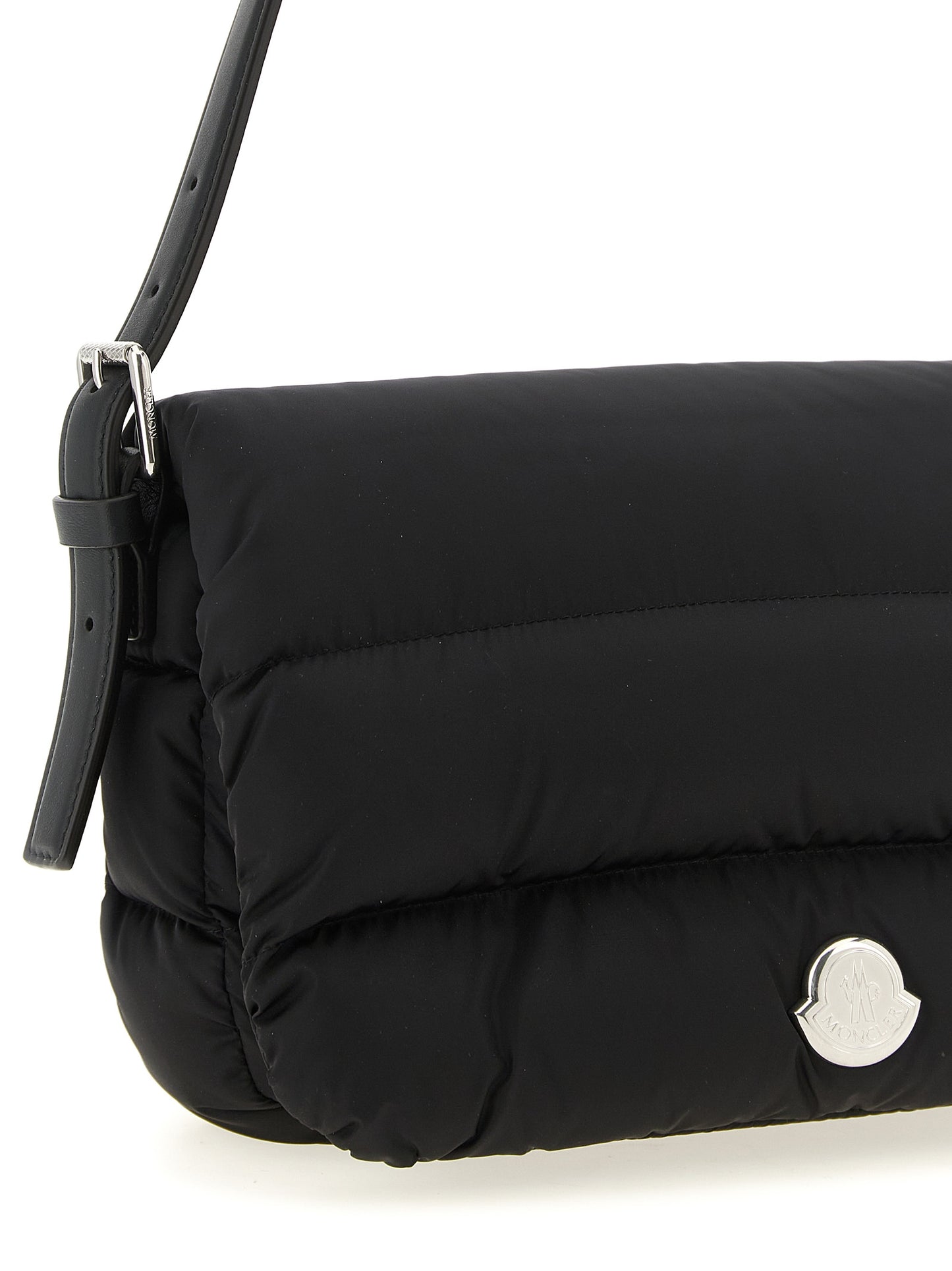 Mini Shoulder Flap Bag by Moncler for women in polyamide leather black, silver & signature showcases a enviable silhouette, artfully detailed with a secure flap, magnetic & buckle, organized , and versatile shoulder-strap, adjustable-strap & handle for a enviable look.