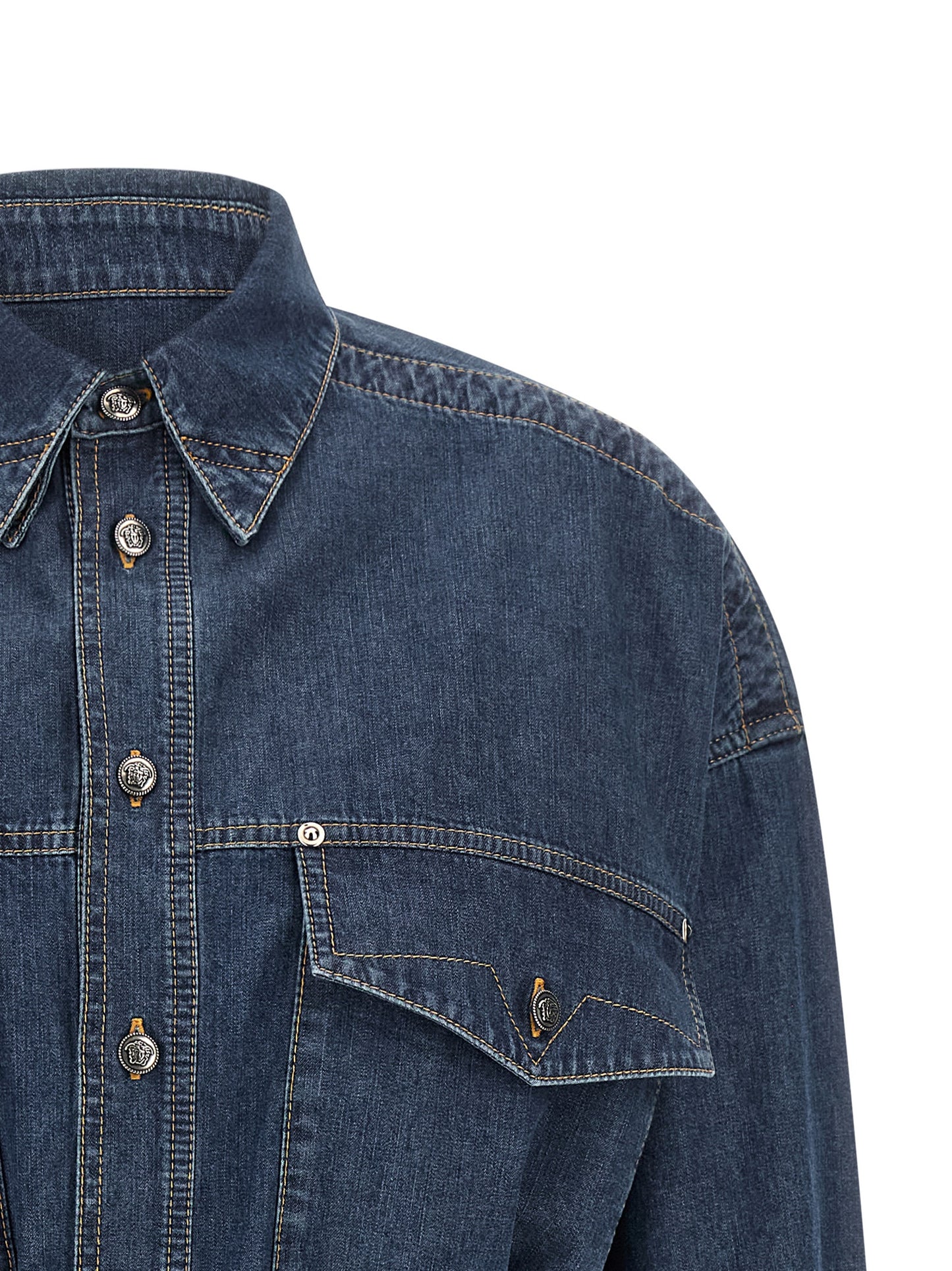 Dress by Versace for women in denim cotton blue features an eye catching silhouette with a sophisticated , elegant , and a refined short mini for a eye catching aesthetic.