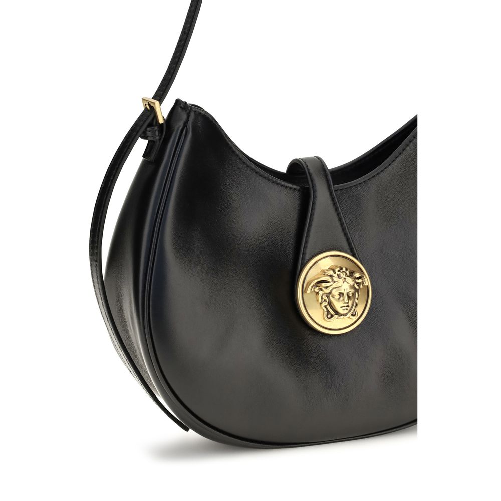 Small Shoulder Hobo Bag by Versace for women in bos taurus calf & lambskin leather black & gold features a effortless chic silhouette with a secure , ample , and versatile shoulder-strap for a effortless chic finish.