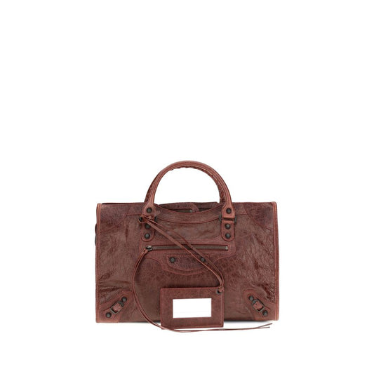 Medium Handbag by Balenciaga for women in leather bordeaux features a refined silhouette, showcasing a secure zipper, organized , and versatile shoulder-strap, adjustable-strap & handle for a refined finish.