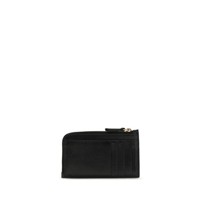 Cardholder Wallet by Chloé for women in bos taurus calf & buffalo leather black & gold showcases a discerning silhouette, artfully capturing the essence of Paddington Bos Taurus Calf & Buffalo Leather Cardholder Wallet with its functional card-organization coin-purse.