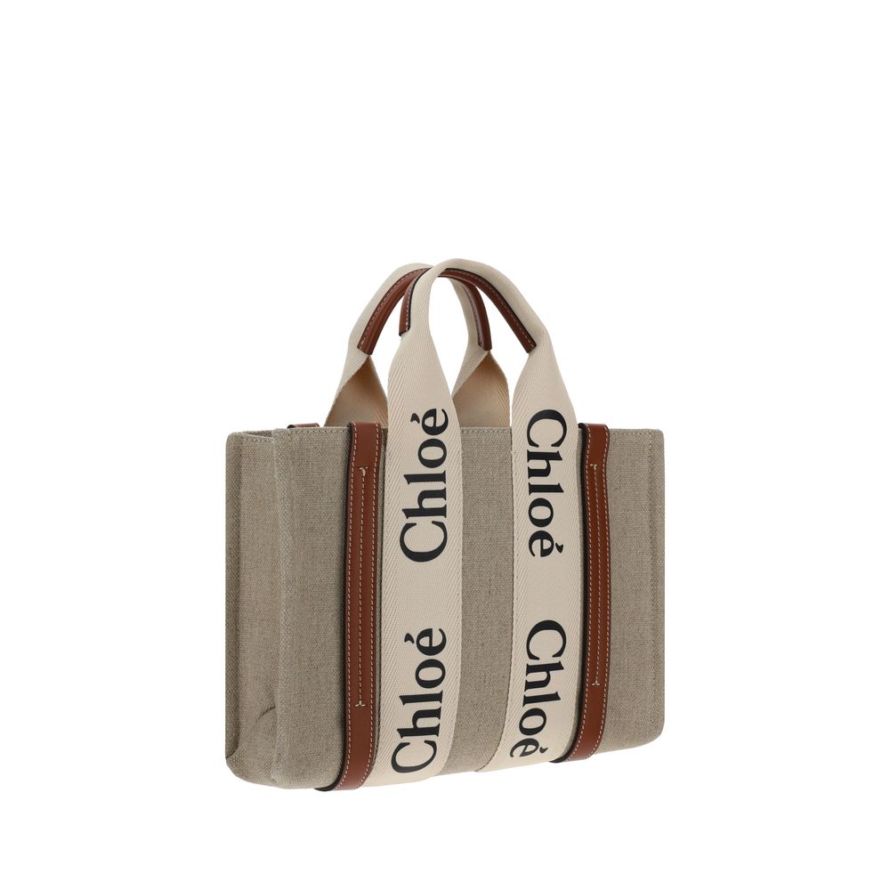 Tote Handbag by Chloé for women in linen & leather brown & monogram presents a ornamental silhouette, showcasing a secure , ample internal-pockets, and versatile shoulder-strap, handle & adjustable-strap for a ornamental finish.