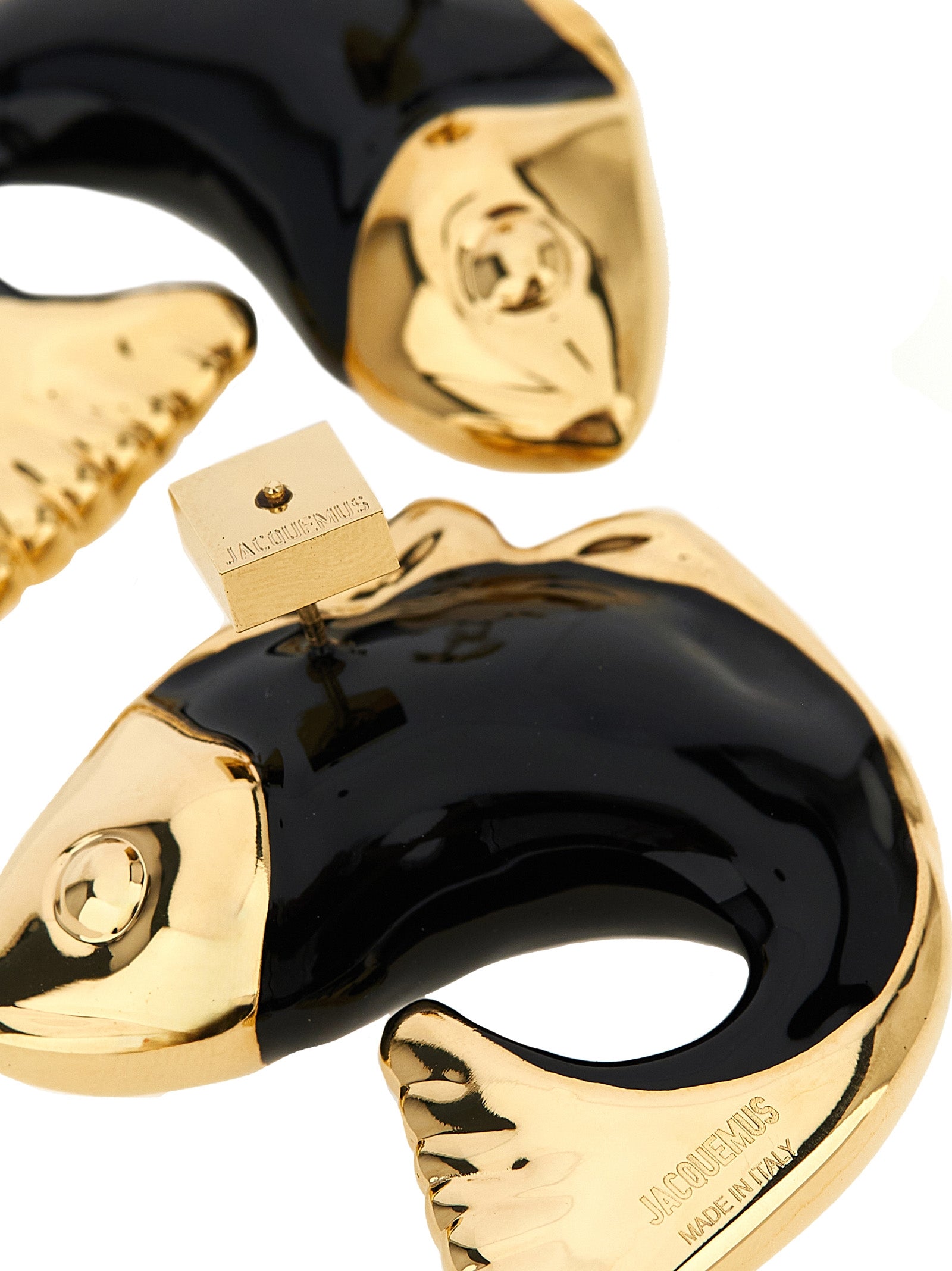 Earrings by Jacquemus for women in cotton black & copper presents a curated silhouette, artfully showcasing the curated and refined aesthetic of the Pivot Women's Copper & Enamel Earrings.