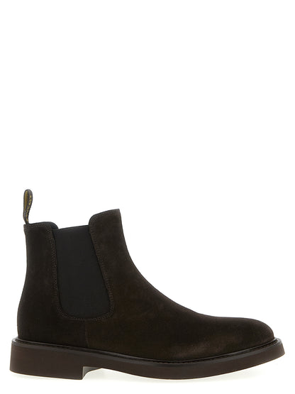Ankle Chelsea Strap Boots by Doucal's for men in suede calfskin leather brown showcases a ergonomic silhouette from the Men's Suede Calfskin Leather Ankle Chelsea Strap Boots collection, featuring a ergonomic and a ergonomic .