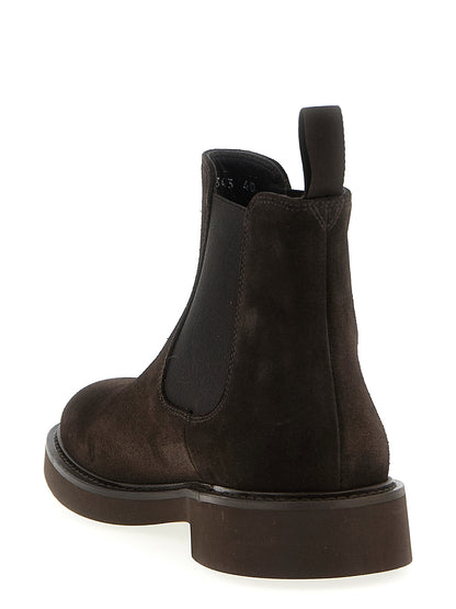 Ankle Chelsea Strap Boots by Doucal's for men in suede calfskin leather brown features an effortless chic silhouette from the Men's Suede Calfskin Leather Ankle Chelsea Strap Boots collection, showcasing a effortless chic and refined for an effortless chic look.