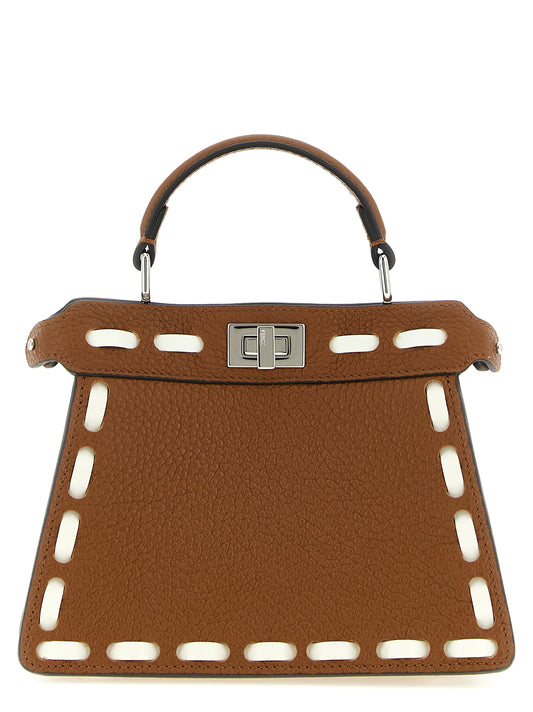 Handbag by Fendi for women in calfskin leather brown, silver & white features a signature silhouette, showcasing a secure turn-lock and signature built-in-compartments with versatile shoulder-strap, handle & adjustable-strap for a sophisticated look.