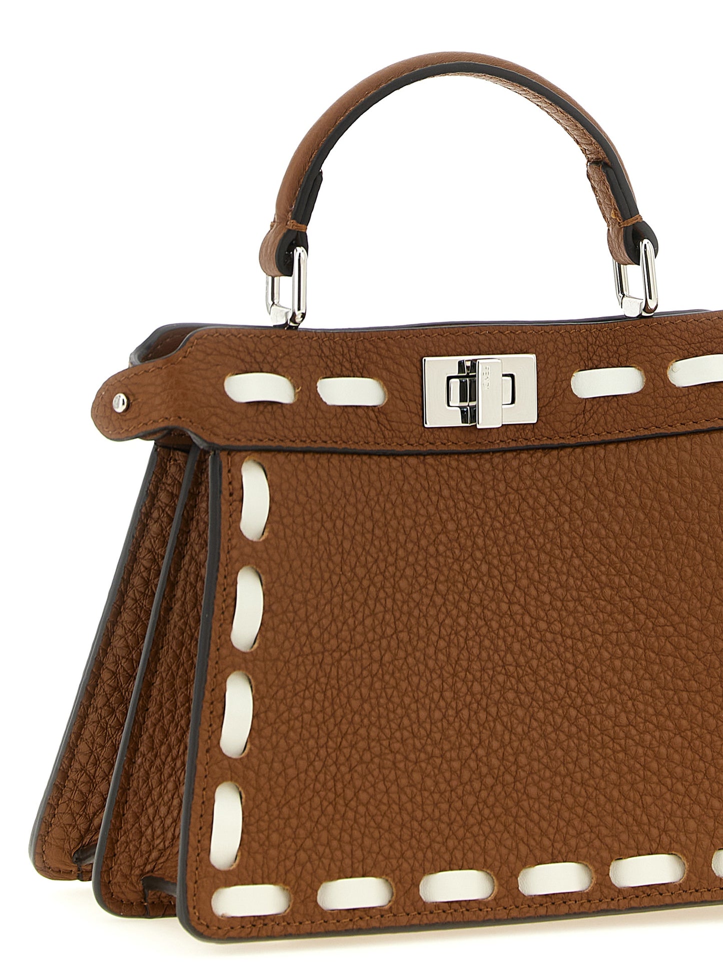 Handbag by Fendi for women in calfskin leather brown, silver & white features an refined silhouette, showcasing a secure turn-lock, ample built-in-compartments, and versatile shoulder-strap, handle & adjustable-strap for a sophisticated refined aesthetic.