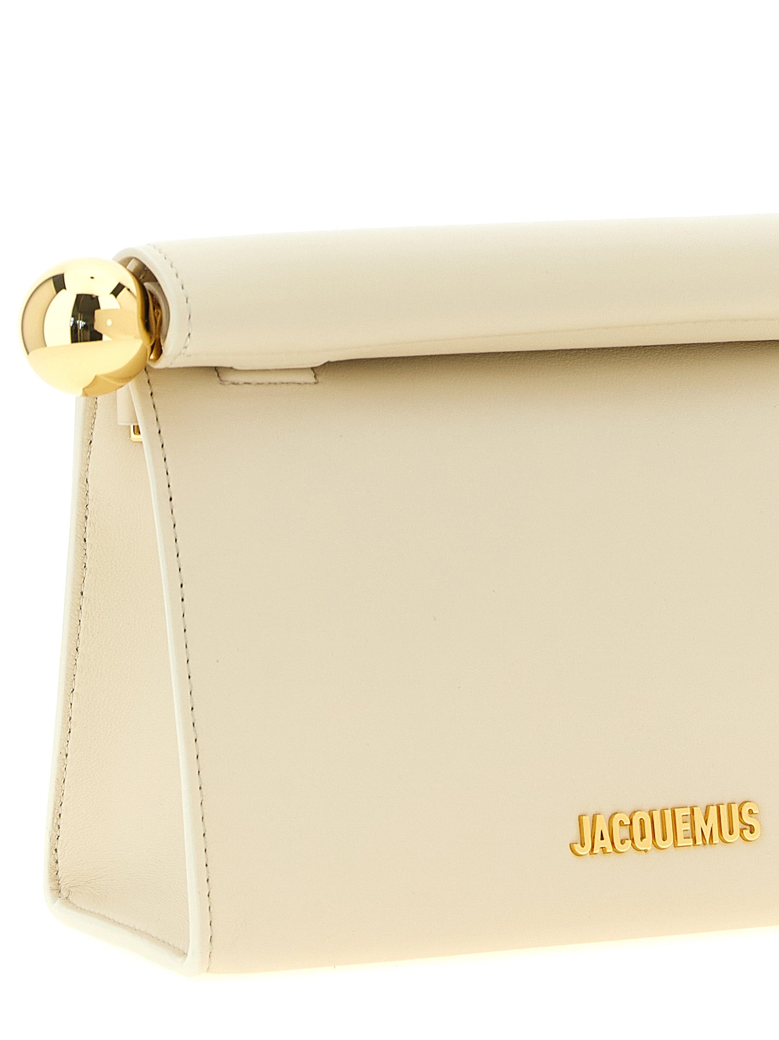 Pouch Clutch Handbag by Jacquemus for women in nappa lamb leather & cotton gold, ivory, natural & white features a architectural silhouette, showcasing a secure magnetic, ample , and versatile shoulder-strap & adjustable-strap for a architectural finish.