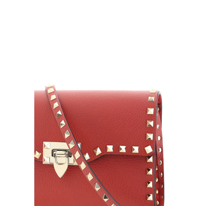 Small Shoulder Bag by Valentino Garavani for women in bos taurus calfskin leather multicolor features an effortlessly chic silhouette with a secure hook, ample , and versatile shoulder-strap & adjustable-strap for effortlessly chic everyday luxury.