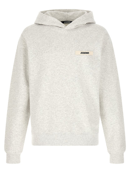 Sweatshirt Hoodie by Jacquemus for men in cotton gray features a edgy silhouette, detailed with a edgy hooded neckline and for a refined finish.