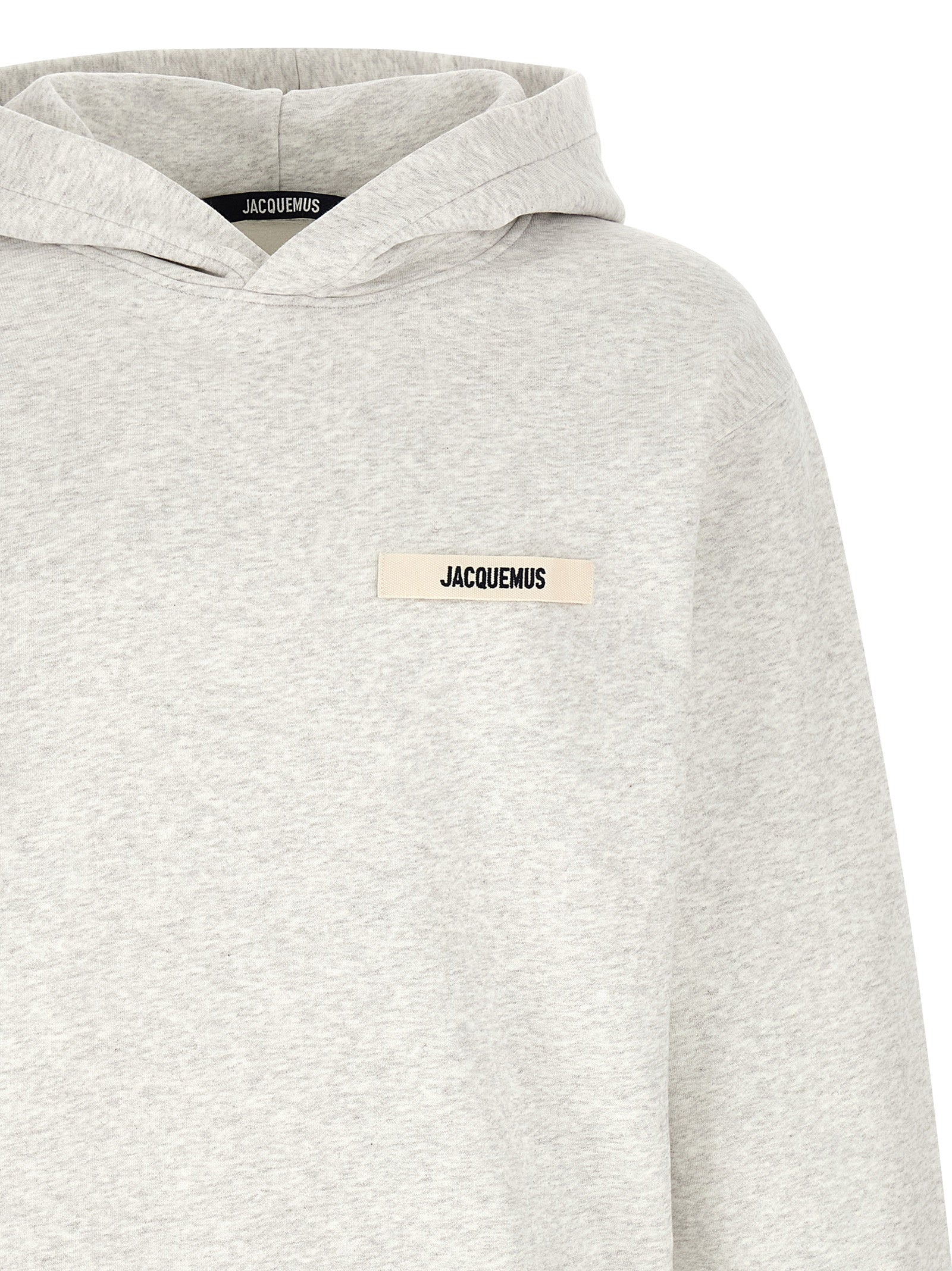 Sweatshirt Hoodie by Jacquemus for men in cotton gray showcases a city-ready silhouette, artfully detailed with a signature hooded neckline and for a city-ready finish.