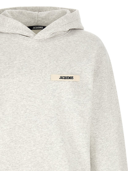 Sweatshirt Hoodie by Jacquemus for men in cotton gray showcases a city-ready silhouette, artfully detailed with a signature hooded neckline and for a city-ready finish.