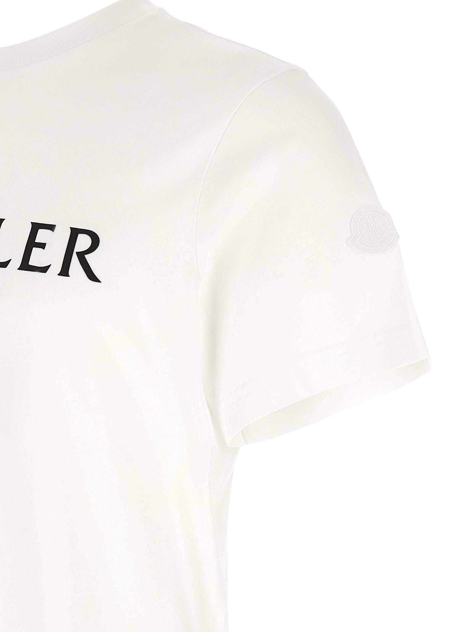 T-Shirt by Moncler for men in cotton felt white & print showcases a fashionable silhouette, elegantly detailed with a fashionable and for a sophisticated, high-fashion look.