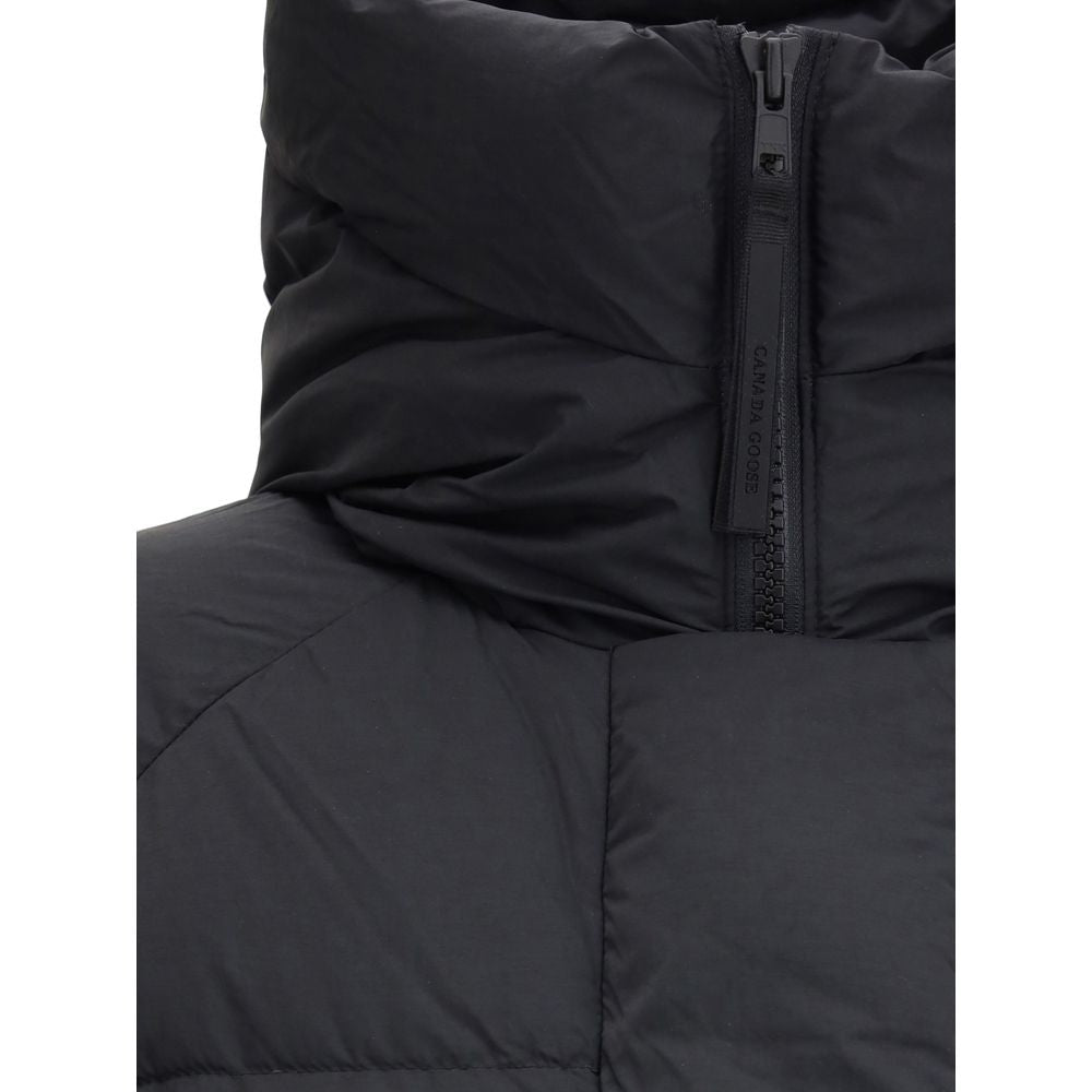 Hooded Overcoat by Canada Goose for women in polyamide & duck down black features an voluminous silhouette, showcasing distinct pockets, hooded & insulated and a voluminous hooded neckline for a truly voluminous aesthetic.