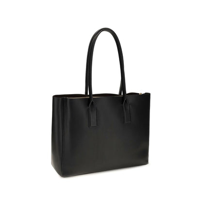 Shoulder Tote Bag by Marc Jacobs for women in bos taurus calf leather black & gold features an effortlessly chic silhouette with a secure , ample , and versatile shoulder-strap & handle for effortlessly chic everyday luxury.
