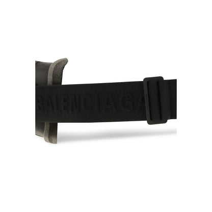 Sunglasses by Balenciaga for men in bos taurus calf leather and black presents a enviable silhouette, featuring black coloured frame and with mirrored lens for a enviable look.
