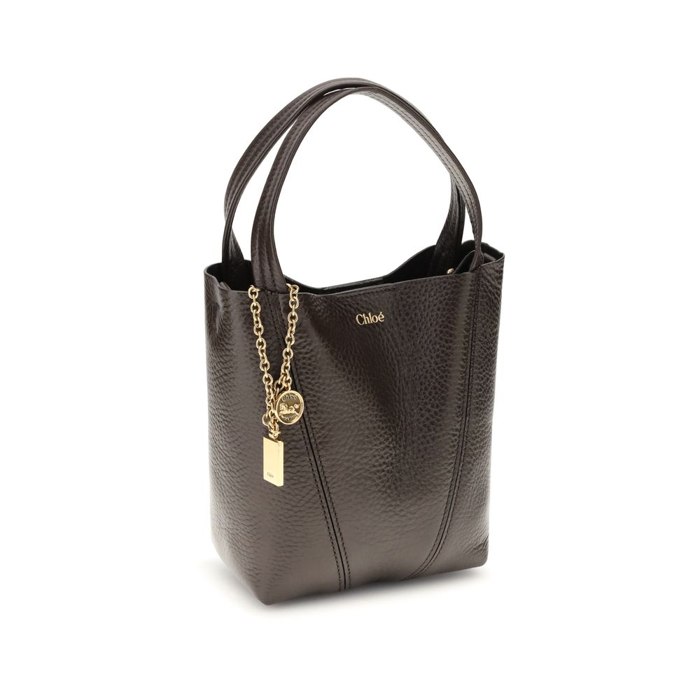 Shoulder Bag by Chloé for women in bos taurus grained leather brown & monogram features a effortless sophistication silhouette, secured by a magnetic & button with ample single-compartment and versatile shoulder-strap, handle & adjustable-strap for a effortless sophistication finish.