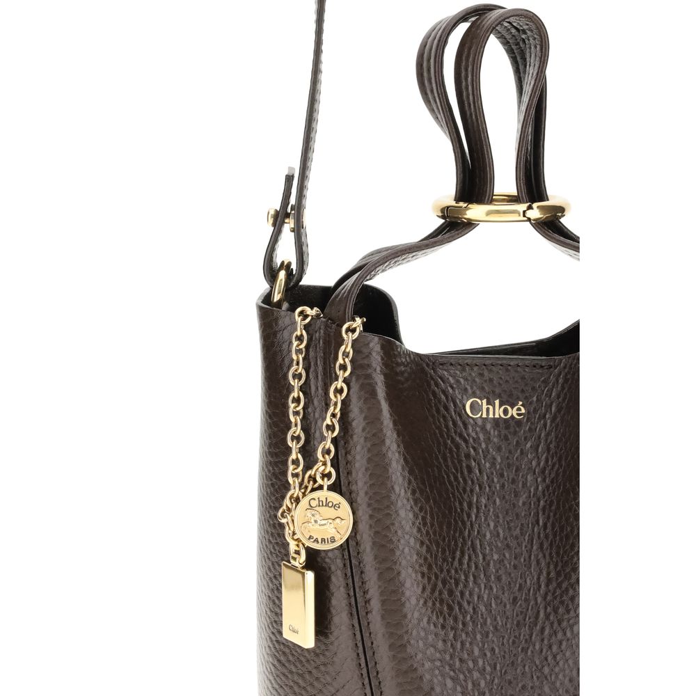 Shoulder Bag by Chloé for women in brown & monogram features an effortlessly chic silhouette with a secure magnetic & button, ample single-compartment, and versatile shoulder-strap, handle & adjustable-strap for effortlessly chic everyday luxury.