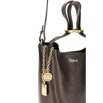Shoulder Bag by Chloé for women in brown & monogram features an effortlessly chic silhouette with a secure magnetic & button, ample single-compartment, and versatile shoulder-strap, handle & adjustable-strap for effortlessly chic everyday luxury.