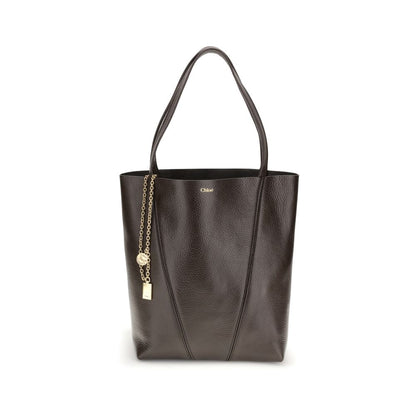 Shoulder Bag by Chloé for women in bos taurus calf grained leather brown & monogram features a effortless sophistication silhouette, secured by a with ample single-compartment and versatile shoulder-strap & handle for a effortless sophistication finish.