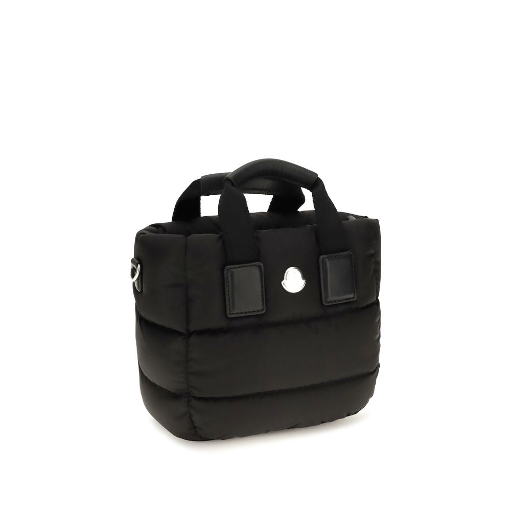 Mini Quilted Shoulder Bag by Moncler for women in nylon leather black features an effortlessly chic silhouette with a secure zipper, ample , and versatile shoulder-strap, adjustable-strap & handle for effortlessly chic everyday luxury.