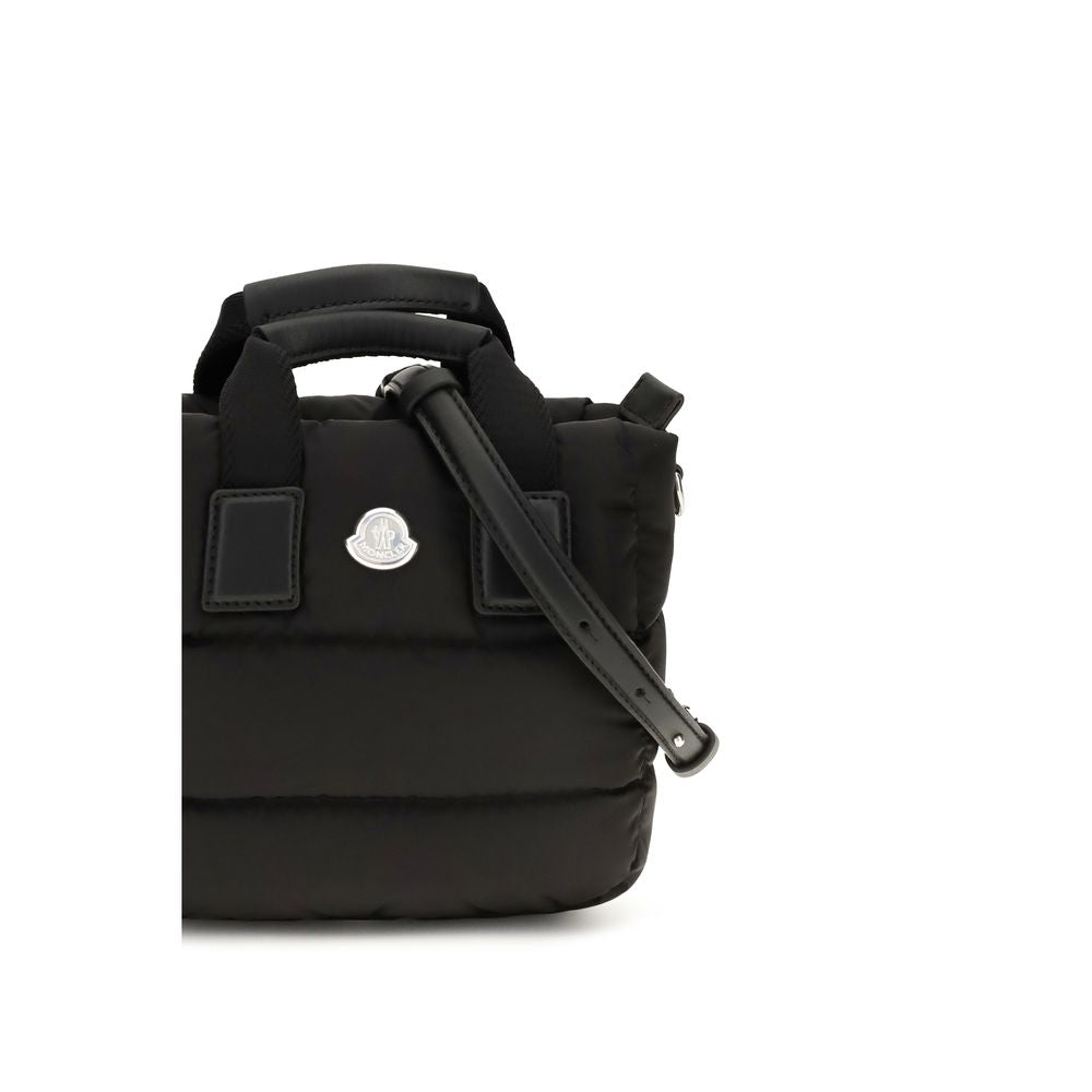 Mini Quilted Shoulder Bag by Moncler for women in nylon leather black features a distinguished silhouette, showcasing a secure zipper and distinguished with versatile shoulder-strap, adjustable-strap & handle for a distinguished finish.