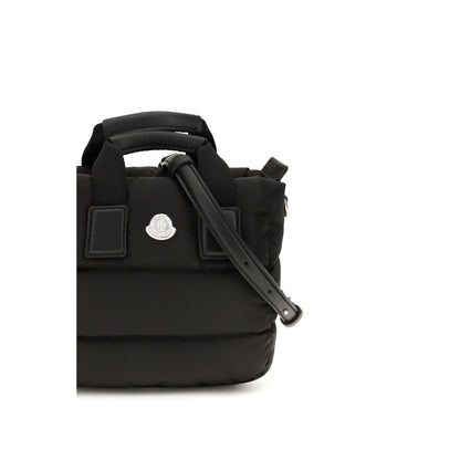 Mini Quilted Shoulder Bag by Moncler for women in nylon leather black features a distinguished silhouette, showcasing a secure zipper and distinguished with versatile shoulder-strap, adjustable-strap & handle for a distinguished finish.