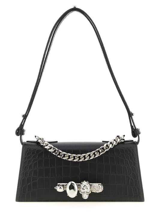 Mini Shoulder Flap Bag by Alexander McQueen for women in bos taurus crocodile calfskin leather black & signature presents a versatile silhouette, showcasing a secure flap & magnetic and versatile with versatile shoulder-strap, adjustable-strap & handle for a sophisticated look.