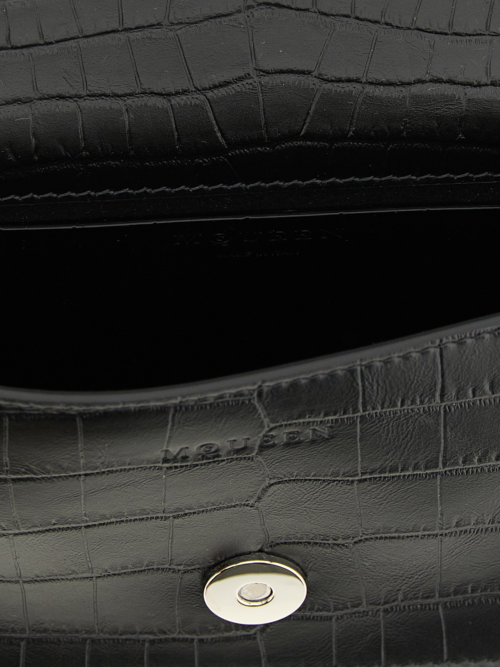 Mini Shoulder Flap Bag by Alexander McQueen for women in bos taurus crocodile calfskin leather black & signature features a enviable silhouette, showcasing a secure flap & magnetic, ample , and enviable shoulder-strap, adjustable-strap & handle for a enviable finish.