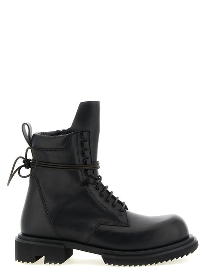 Ankle Chelsea Combat Boots by Rick Owens for men in calfskin leather military-green & black features an dynamic silhouette, showcasing the dynamic Men's Calfskin Leather Ankle Chelsea Combat Boots design with its distinctive and elegant .