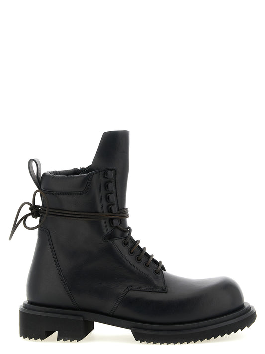 Ankle Chelsea Combat Boots by Rick Owens for men in calfskin leather military-green & black features an dynamic silhouette, showcasing the dynamic Men's Calfskin Leather Ankle Chelsea Combat Boots design with its distinctive and elegant .