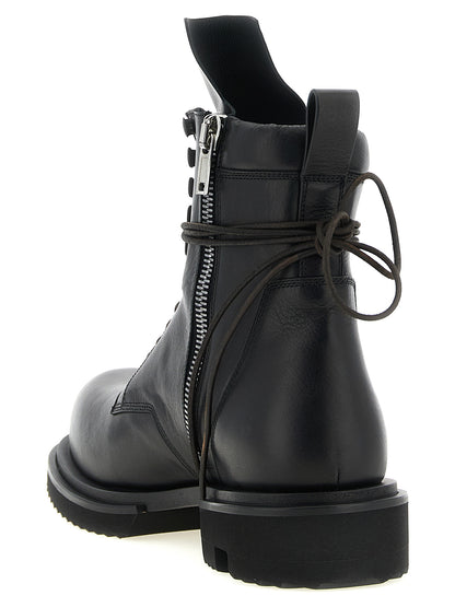 Ankle Chelsea Combat Boots by Rick Owens for men in calfskin leather military-green & black showcases a ergonomic silhouette from the Men's Calfskin Leather Ankle Chelsea Combat Boots collection, featuring a ergonomic and a ergonomic .