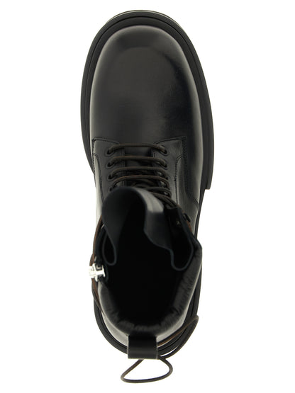 Ankle Chelsea Combat Boots by Rick Owens for men in calfskin leather military-green & black features an dynamic silhouette, showcasing the dynamic Men's Calfskin Leather Ankle Chelsea Combat Boots design with its distinctive and elegant .