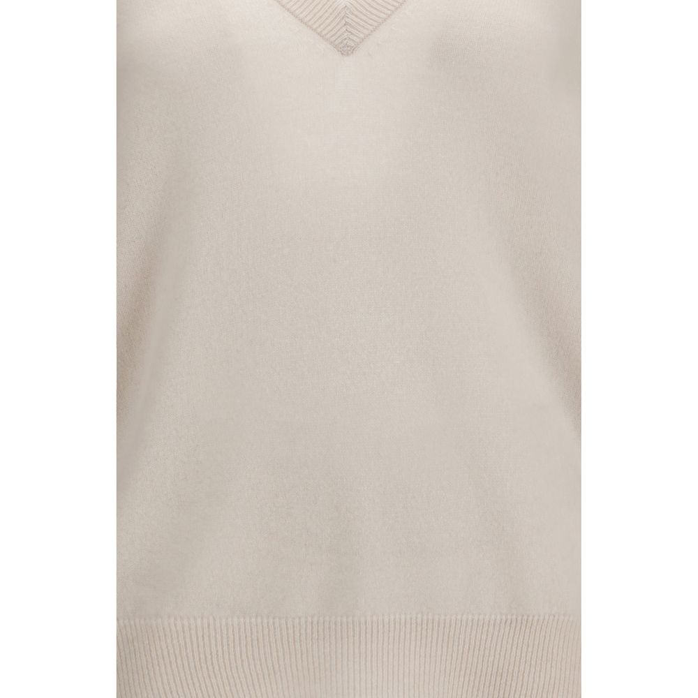 Sweater by Extreme Cashmere for women in cashmere & capra leather beige showcases a discreet silhouette, finished with a discreet and for a discreet look.