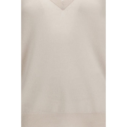 Sweater by Extreme Cashmere for women in cashmere & capra leather beige showcases a discreet silhouette, finished with a discreet and for a discreet look.