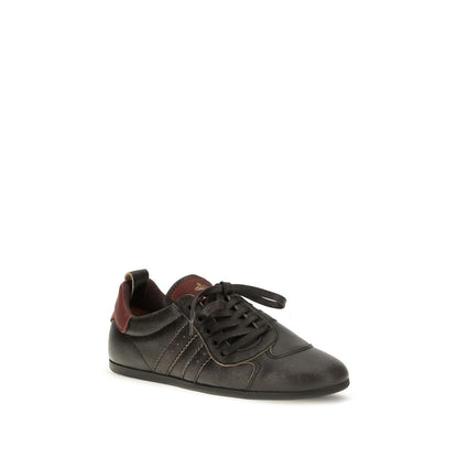 Sneakers by Vivienne Westwood for women in distressed bos taurus calf leather black & print features a chic design, perfectly showcasing the chic fashion style of this Orb Women's Fashion Distressed Bos Taurus Calf Leather Sneakers.