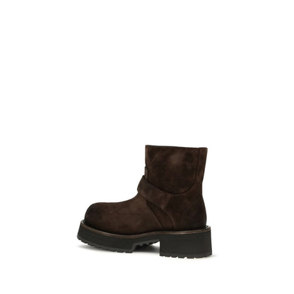Ankle Strap Boots by Balenciaga for women in bos taurus calf suede leather brown features an effortless chic silhouette from the Women's Bos Taurus Calf Suede Leather Ankle Strap Boots collection, showcasing a effortless chic and refined round toe style for an effortless chic look.