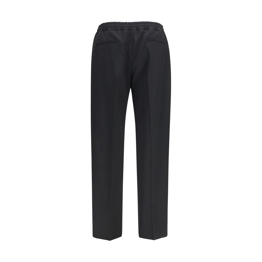 Chinos Pants by Valentino Garavani for men in cotton black & signature features a modern silhouette, showcasing a modern regular-fit with a long and for a refined finish.